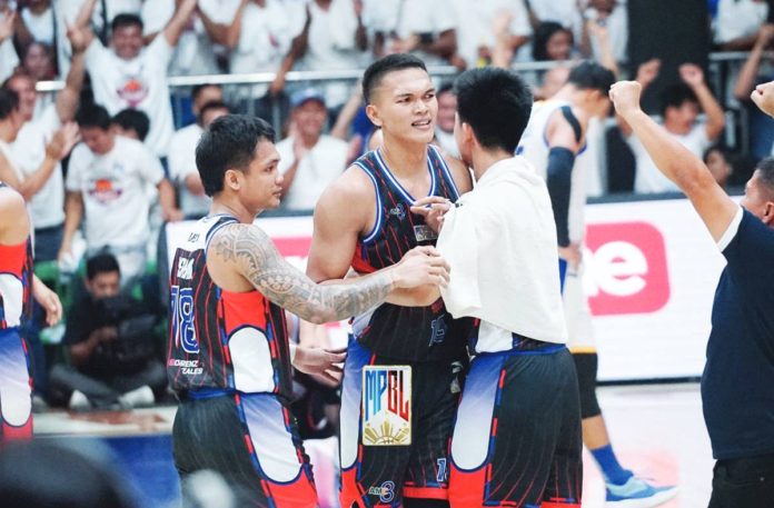 Encho Serrano and Justine Baltazar celebrate as Pampanga Giant Lanterns captures the MPBL crown. MPBL PHOTO