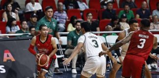 Barangay Ginebra San Miguel Kings’ LA Tenorio looks to pass the ball while being defended by Terrafirma Dyip’s Juan Miguel Tiongson. PBA PHOTO
