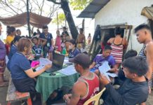 SSS Olongapo Branch personnel assist fisherfolk with their registration and various concerns about SSS during the conduct of the SSS e Wheels program in Cawag, Subic, Zambales last October 26, 2023.