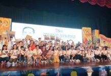 Grantees of the Integrated Scholarships and Incentives Program (ISIP) for the Youth: Empowering Students through Education and Opportunity pose with officials, led by House Speaker Martin Romualdez, during the launch at West Visayas State University cultural center in La Paz, Iloilo City on Saturday, Dec. 9. PNA PHOTO BY PGLENA