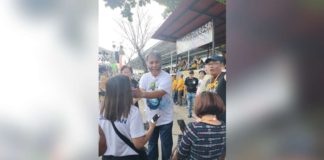Mayor Salvador Escalante Jr. of Cadis City, Negros Occidental led the smudging of paint, or lamhitanay, at the judging area before the tribal street dance competition in celebration of the 50th Dinagsa Festival on Sunday, Jan. 28.