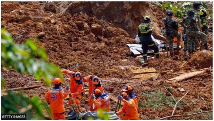 colombia Members of a rescue team search for people trapped at the area of a landslide in the road between Quibdo and Medellin, Choco department, Colombia on Jan. 13, 2024. GETTY IMAGES