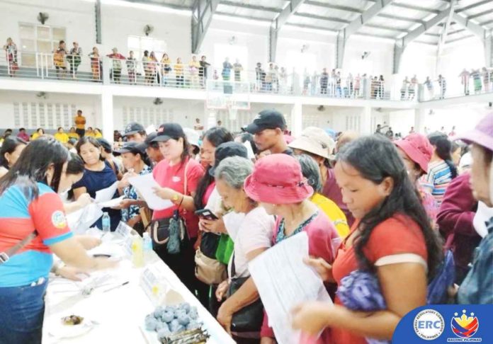 The Energy Regulatory Commission proposes that the penalties paid by violating power industry players would be return as refunds or discounts to consumers affected by power outages. Photo shows members of the low-income households attending the education campaigns on Lifeline Rate program in Dolores, Eastern Samar. ENERGY REGULATORY COMMISSION PHOTO