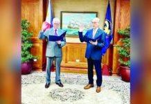 Diokno takes oath as BSP Monetary Board member Former Finance secretary Benjamin Diokno (right) takes oath as Bangko Sentral ng Pilipinas (BSP) Monetary Board member before BSP governor and Monetary Board chairman Eli Remolona Jr. (left). @TED_CORDERO, X PHOTO
