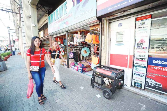 front_pic_resized Lacking power generators, some business establishments in Iloilo city and province have been unable to operate since Tuesday afternoon when a massive power interruption hit Panay Island. But some do have power generators like this business establishment in downtown Iloilo City. The portable power generator does not occupy much sidewalk space. ILOILO CITY MAYOR’S OFFICE PHOTO