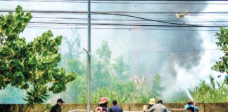 The Bureau of Fire Protection (BFP) Region 6 highlights the importance of public cooperation in maintaining clean surroundings to prevent grass and garbage fires. File photo shows BFP personnel responding to a grass fire in Barangay San Rafael, Mandurriao, Iloilo City. PN PHOTO