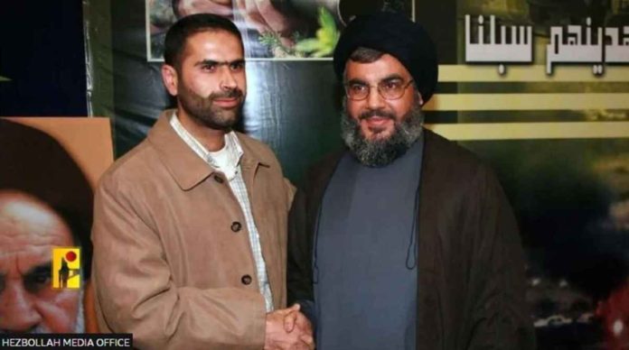 israel_resized This hand-out image from the Hezbollah Media Office shows Wissam Tawil (left), a commander killed in a suspected Israeli strike in southern Lebanon on Jan. 8, 2024, shaking hands with leader Hassan Nasrallah. HEZBOLLAH MEDIA OFFICE
