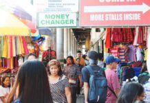 A P30 increase in the daily minimum wage of private workers in Western Visayas took effect on Nov. 16, 2023. File photo shows people flocking to stores in Iloilo City’s downtown area for some last-minute minute shopping before Christmas day. AJ PALCULLO/PN