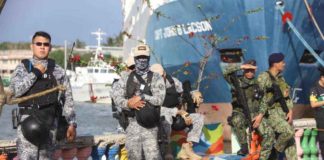 Hundreds of cops from the Iloilo Police Provincial Office will be deployed in Iloilo City during the Dinagyang Festival. Photo shows police and coast guard personnel securing Friday’s opening salvo. ILOILO CITY MAYOR’S OFFICE PHOTO