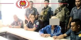 A 71-year-old female New People’s Army member surrenders to the local government and municipal police of La Castellana, Negros Occidental on Tuesday, Jan. 23. NOCPPO PHOTO