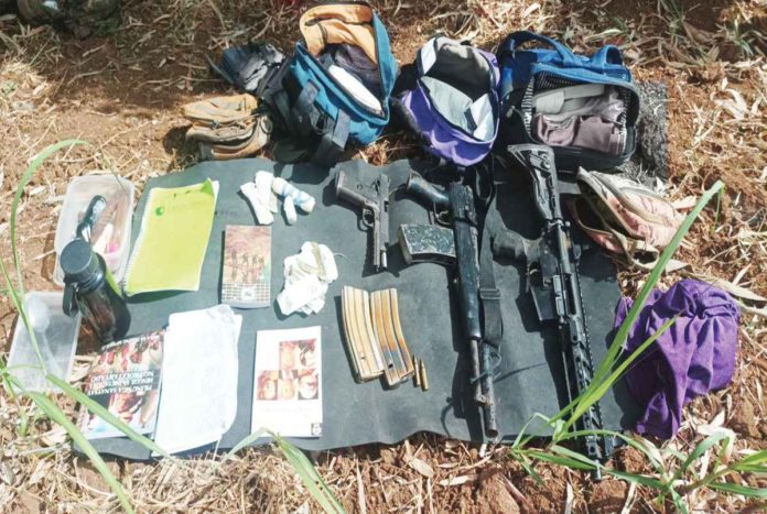 rebels_resized The recoveries after a gun battle between the government troops and New People’s Army in La Castellana, Negros Occidental yesterday. Two alleged rebels, whose identities remain unknown, died. 62ND INFANTRY BATTALION / FACEBOOK