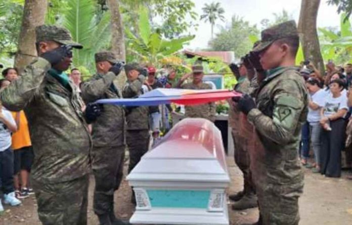 Private First Class Rodelo Alfanza, who died in Tubungan, Iloilo encounter, was laid to rest in a private cemetery in Barangay Bato, Sagay City, Negros Occidental on Jan. 28, 2024. A gun salute was held to honor Alfanza’s committed and dedicated service to the Philippine Army and the nation. PHILIPPINE ARMY SPEARHEAD TROOPERS FACEBOOK PHOTO