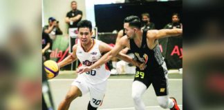 Negrense Jeff Manday of Meralco Bolts dribbles the ball while warding off the defense of TNT Triple Giga's Gryann Mendoza. PBA PHOTO