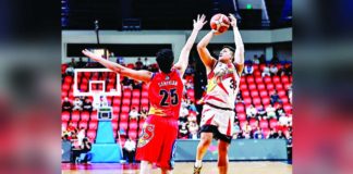 Ilonggo Jericho Cruz of San Miguel Beermen attempts a fall away shot against the defense of Rain or Shine Elasto Painters’ Leonard Santillan. PBA PHOTO