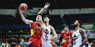San Miguel Beermen’s Jeron Teng eludes the Blackwater Bossing defense for a layup. PBA PHOTO