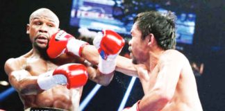 Manny Pacquiao lands a punch against Floyd Mayweather Jr. during their first encounter on May 3, 2015. PHOTO COURTESY OF ESTHER LIM/SHOWTIME