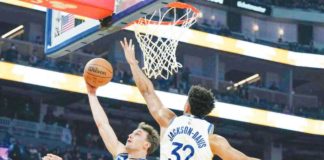 Golden State Warriors’ Trayce Jackson-Davis attempts to block the shot of Orlando Magic’s Franz Wagner. PHOTO COURTESY OF LOREN ELLIOT/AP