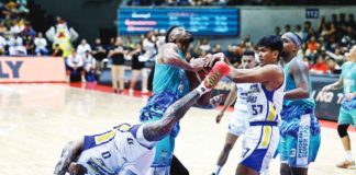 Magnolia Chicken Timplados Hotshots’ Aris Dionisio and Magnolia Chicken Timplados Hotshots’ Aris Dionisio battle for the loose ball. PBA PHOTO