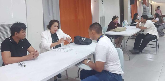 Students from Iloilo Science and Technology University La Paz campus avail themselves of the one-on-one free legal consultation from lawyers of the Public Attorney's Office in Iloilo City. GEROME M. DALIPE IV PHOTO