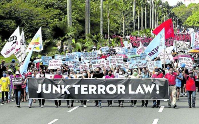 terror_resized Various groups gather at the University of the Philippines in Quezon City in this December 2021 photo to call for the junking of the Anti-Terrorism Act of 2020 during the commemoration of International Human Rights Day. File photo by RICHARD A. REYES / Philippine Daily Inquirer