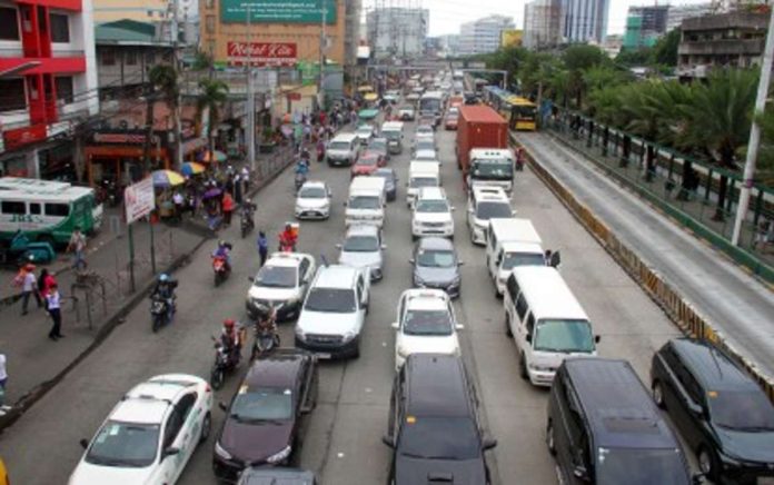 vehicle_sales_resized Vehicles ply the Epifanio de los Santos Avenue (EDSA) in this undated photo. The Chamber of Automotive Manufacturers of the Philippines, Inc. and Truck Manufacturers Association reported on Wednesday, Jan. 17, that local automotive vehicle sales in 2023 breached its 423,000 target as assemblers sold a total of 429,807 units last year. PNA FILE PHOTO