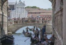 Venice bans large tourist groups Gondolas slowly pass under the Bridge of Sighs near St. Mark’s Square due to too much traffic in Venice. GETTY IMAGES