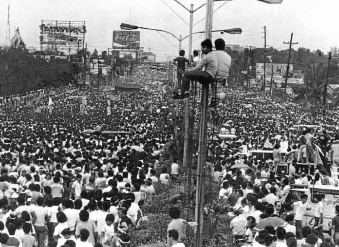 EDSA Thousands of people jam Edsa on Feb. 23, 1986. The 1986 Edsa People Power Revolution served as a “beacon of hope” for millions, promising freedom, democracy, and equality. It also offered a new opportunity for improved Filipino workers’ rights. But some of the bright possibilities brought by the world-renowned bloodless uprising that led to the ouster of a dictator remained a promise 38 years later, according to labor leaders. PEOPLE POWER BOOK, THE PHILIPPINE REVOLUTION OF 1986
