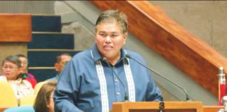 Cong. Gus S. Tambunting, chairman of the House of Representatives' committee on legislative franchises, presents his committee report on House Bill 9310, which outlines the transfer of the franchise from Central Negros Electric Cooperative to Negros Electric and Power Corporation, at the Batasang Pambansa plenary hall on Tuesday, Feb. 13.