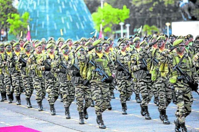 NPA_resized Members of elite units of the Armed Forces of the Philippines march in Camp Aguinaldo. INQUIRER FILE HOTO