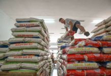 PH rice imports surge in first 2 months of 2024 A worker arranges sacks of rice at a local rice store in Quezon City. ABS-CBN NEWS PHOTO