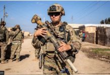 US forces set to strike Iranian targets in Syria and Iraq US troops on patrol in Syria earlier this month. GETTY IMAGES