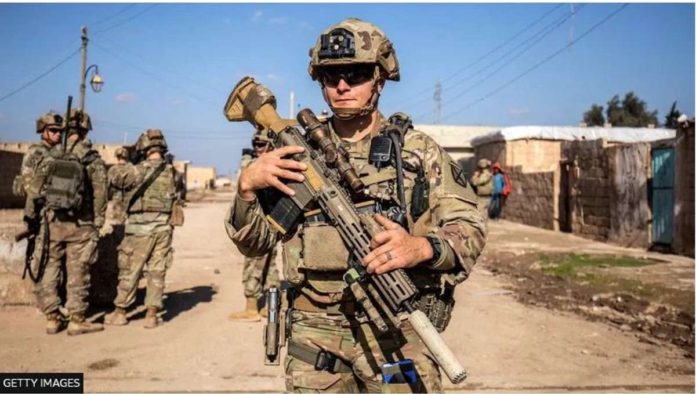 US.JPG_resized US troops on patrol in Syria earlier this month. GETTY IMAGES