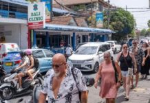 Foreign tourists in Bali to pay $10 entry tax Millions of tourists are drawn to Bali’s beaches and resorts each year. EPA