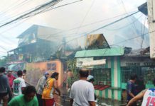 Firefighters and local residents battle a blaze that erupted in Barangay San Nicolas, La Paz, Iloilo City on the afternoon of Sunday, February 18. The fire resulted in two deaths. AJ PALCULLO/PN