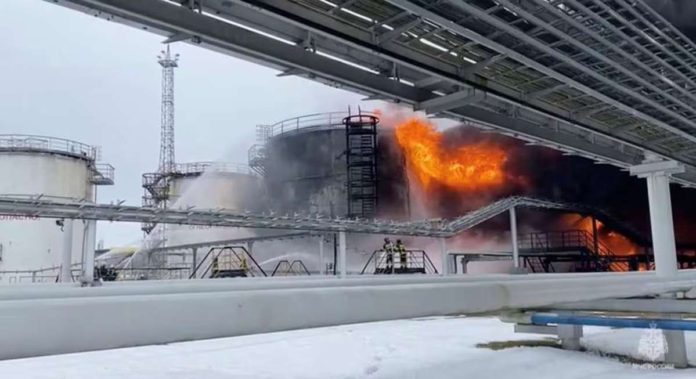 fuel_prices.JPG_resized Firefighters extinguish oil tanks at a storage facility that local authorities say caught fire after the military brought down a Ukrainian drone, in the town of Klintsy, Bryansk Region in Russia on Jan. 19, 2024, in this still image taken from video. The Department of Energy said the uptrend in fuel pump prices in the Philippines could be attributed to the drone attack. RUSSIAN EMERGENCIES MINISTRY/HANDOUT VIA REUTERS/FILE PHOTO