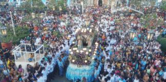 A sea devotees and pilgrims from across the country join the traditional solemn procession for the Feast of Nuestra Señora de la Candelaria (Our Lady of Candles) in Jaro, Iloilo City on Friday afternoon, Feb. 2. The processional image is one of the three main images of Candelaria in the Jaro Metropolitan Cathedral. ARCHDIOCESE OF JARO – COMMISSION ON SOCIAL COMMUNCATIONS PHOTO