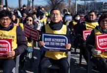 South Korea doctors strike vs additional physicians Doctors stage rallies in Seoul, South Korea protesting against the government’s plan to bump up numbers. GETTY IMAGES