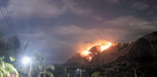 A forest fire razed a portion of Mt. Napulak covering barangays Corucuan, Tigbanaba, Lab-on, and Bagay in Igbaras, Iloilo on Friday night, February 23. BERT ESPOSADO PHOTO