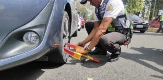 The Bacolod Traffic Authority Office conducts clamping and towing operations on Gatuslao Street, where several lawyers of the Hall of Justice ask for more parking space to avoid violations. In response, the city government mulls implementing a pay parking scheme. BACOLOD PIO PHOTO