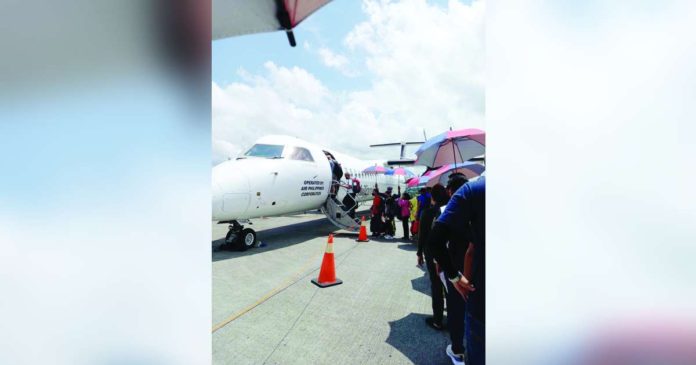 plane tickets_superimposed Passengers flying from Manila to Iloilo, Bacolod, Tacloban, and Puerto Princesa will be paying a fuel surcharge of P388 beginning next month. PEARL SOCIAS PHOTO