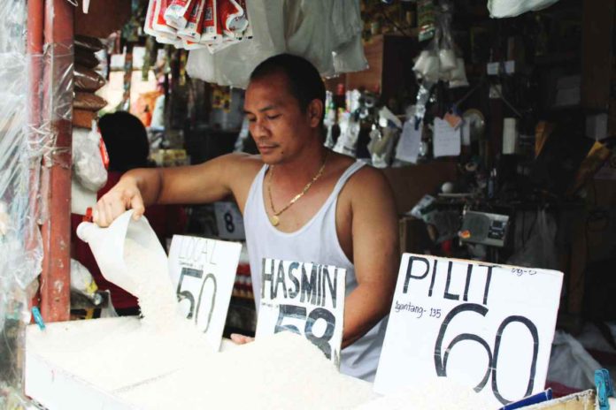 rice_prices.JPG_resized Well-milled rice prices are seen to go down to P44 to P46 a kilo following the price drop abroad. AJ PALCULLO/PN