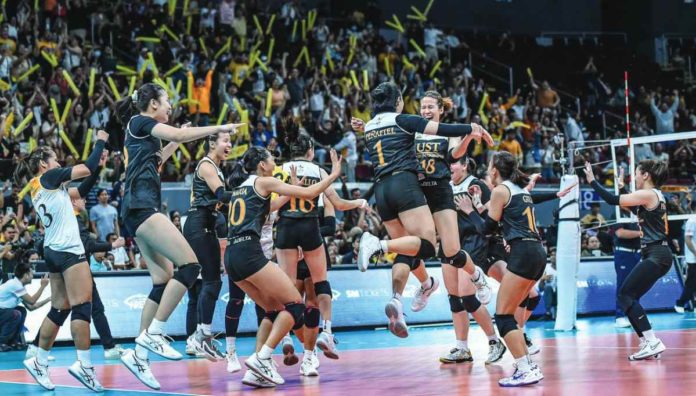 sports UST University of Santo Tomas Golden Tigresses rejoices following their win over the National University Lady Bulldogs. UAAP PHOTO