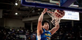 Gilas Pilipinas’ Carl Tamayo scores on a two-handed dunk. FIBA PHOTO