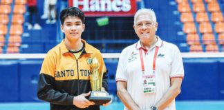 Negrense Joncriz Ayco of the University of Santo Tomas Junior Golden Spikers receives his MVP trophy. UAAP PHOTO