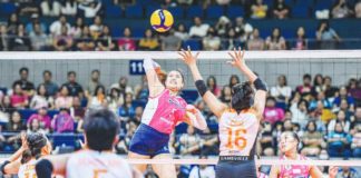 Creamline Cool Smashers’ Risa Sato attempts an attack against Farm Fresh Foxies Riza Cruz. PVL PHOTO