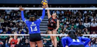 University of the East Lady Red Warriors’ Casiey Dongallo attempts to score against the defense of Ateneo de Manila University Blue Eagles’ Alexa Miner. UAAP PHOTO