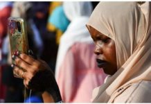 Sudan hit by internet blackout as war rages A woman checks her mobile phone. Some Sudanese telecom providers have been experiencing signal problems. REUTERS