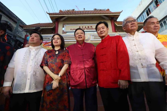 treñas-cny Mayor Treñas is seen in this file photo with Zhang Zhen, Consul General of the People's Republic of China in Cebu, during the Chinese New Year grand cultural show on Isnart Street. ARNOLD ALMACEN/Iloilo City Mayor's Office