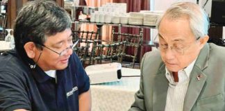 Negros Electric Power Cooperative president Roel Castro and Metro Bacolod Chamber of Commerce and Industry vice president for government affairs Frank Carbon during the Negros Island Electric Power Forum on Wednesday, March 20.