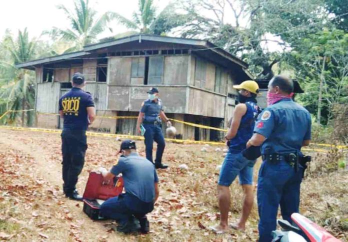 A couple from San Lorenzo, Guimaras was brutally killed. Their decomposing bodies were found on Friday afternoon, March 15, outside their house. PHOTO COURTESY OF AKSYON RADYO ILOILO